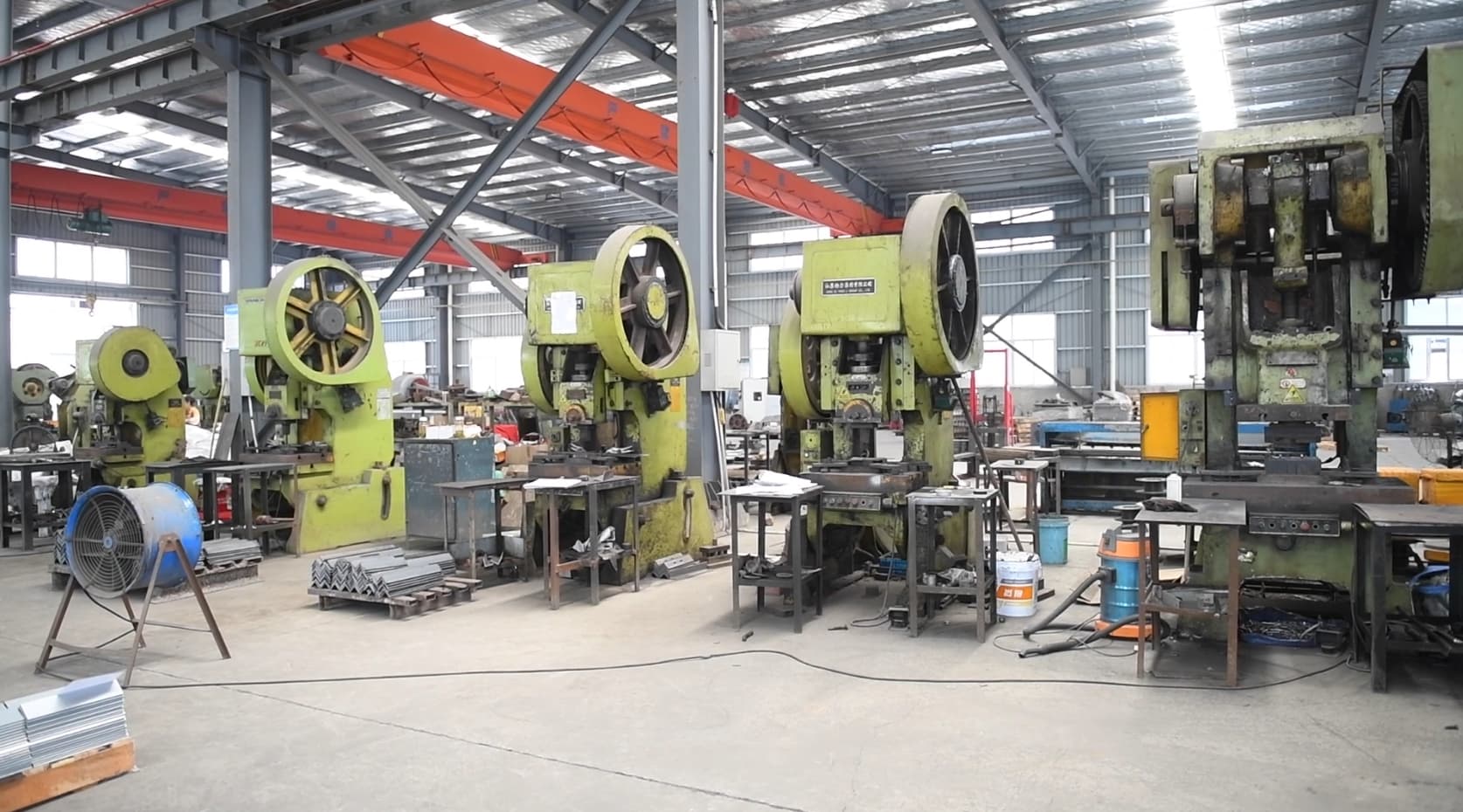 Press equipment operating in a factory workshop