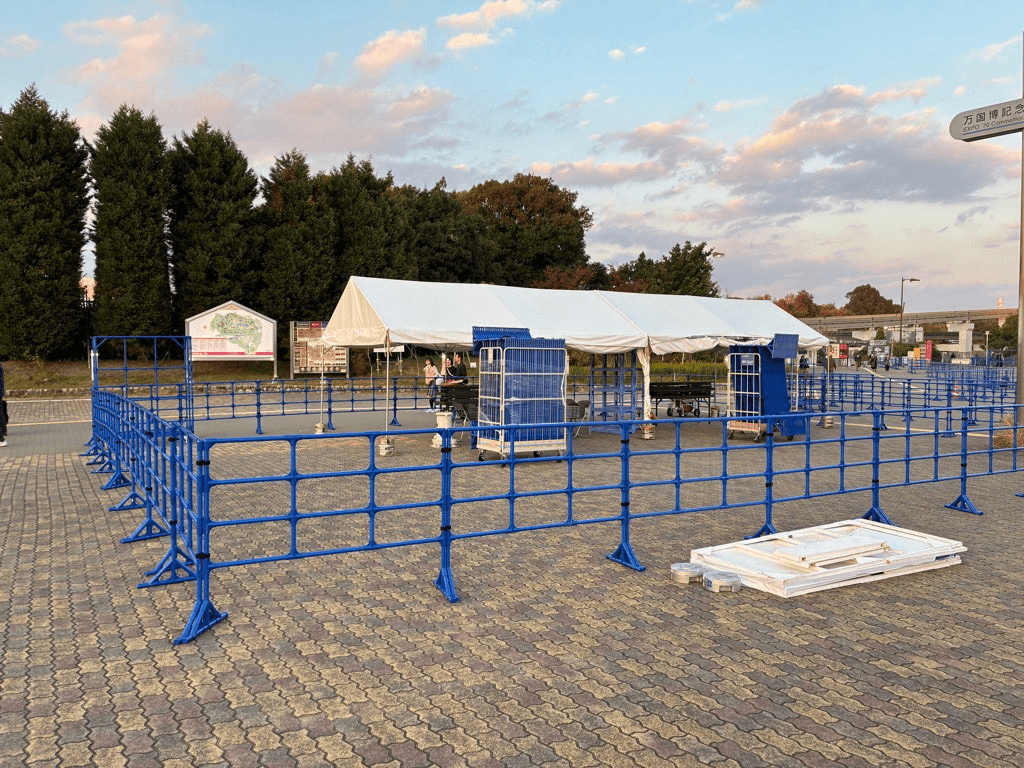 Blue Event Fence system in use around a temporary outdoor venue