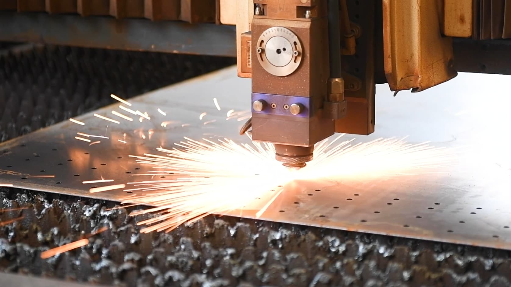 Laser cutting during metal fabrication