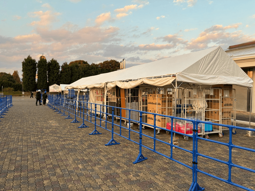 Blue Event Fence used around a tent at an event in Japan