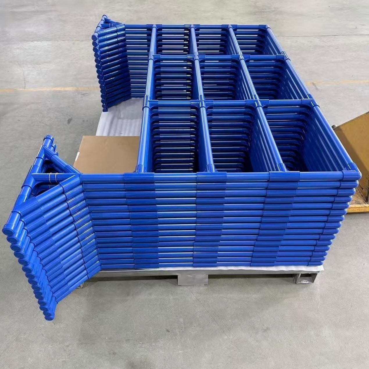 Stacked Event Fence panels on a pallet